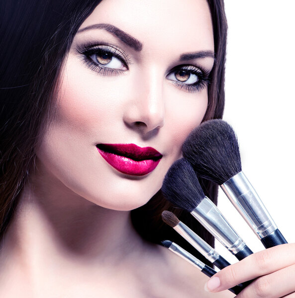 Woman with Makeup Brushes.