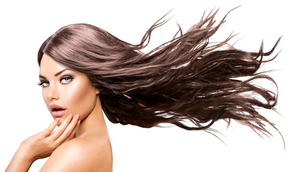 Ragazza con lunghi capelli che soffiano — Foto Stock