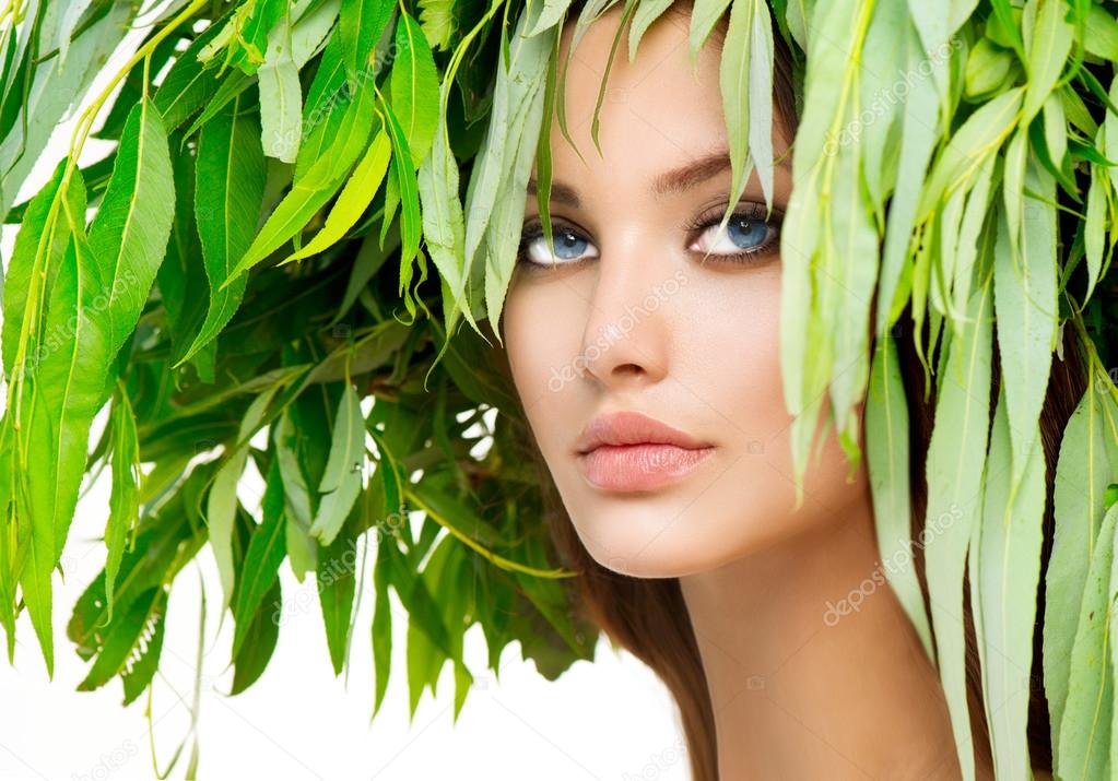 Girl with green leaves