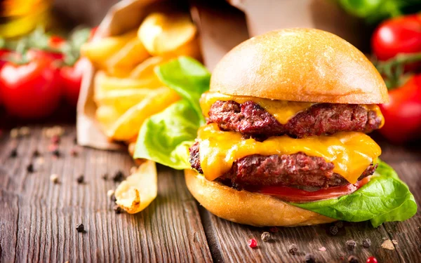 Cheeseburger with fresh salad