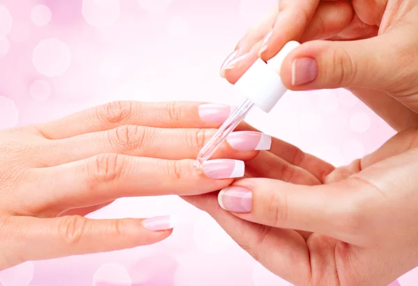 Manicure, hands spa cuticle oil. — Stock Photo, Image