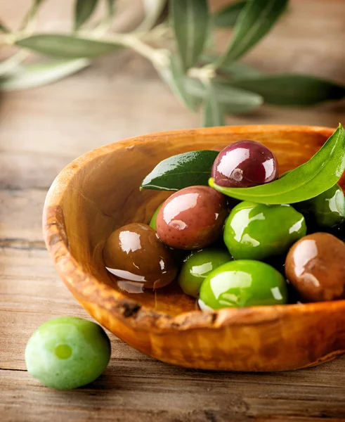 Olives and Olive Oil on  table. — Stock Photo, Image