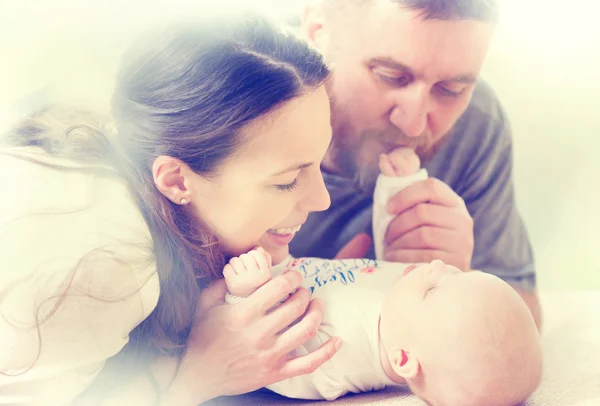 Happy family and  newborn baby — Stock Photo, Image