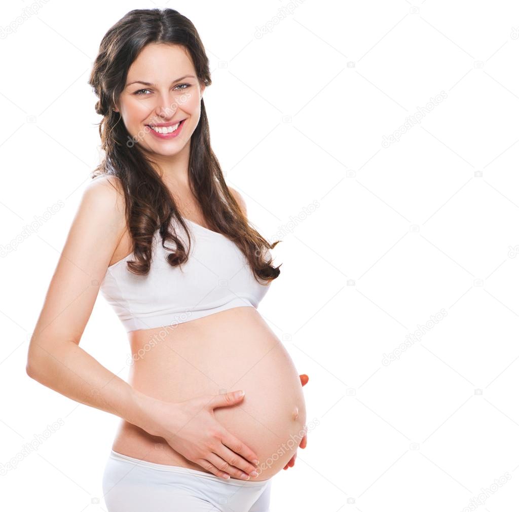 Happy pregnant woman touching  belly.