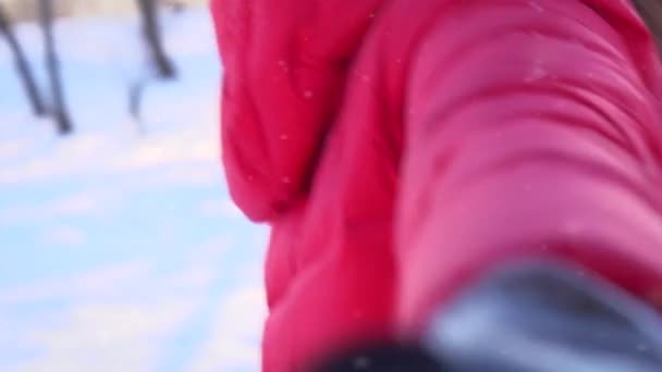 Joyful girl running in winter park — Stock Video