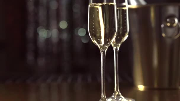 Two Flutes with Sparkling Wine. — Stock Video