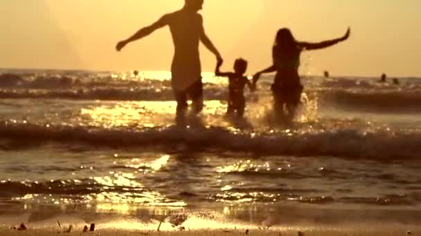 Happy family with child at  beach — Stock Video