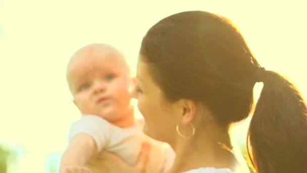 Mother and baby in spring park — Stock Video