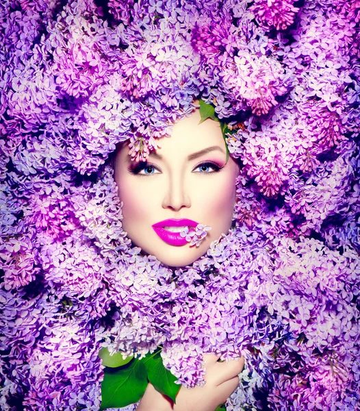 Girl with lilac flowers hairstyle — Stock Photo, Image