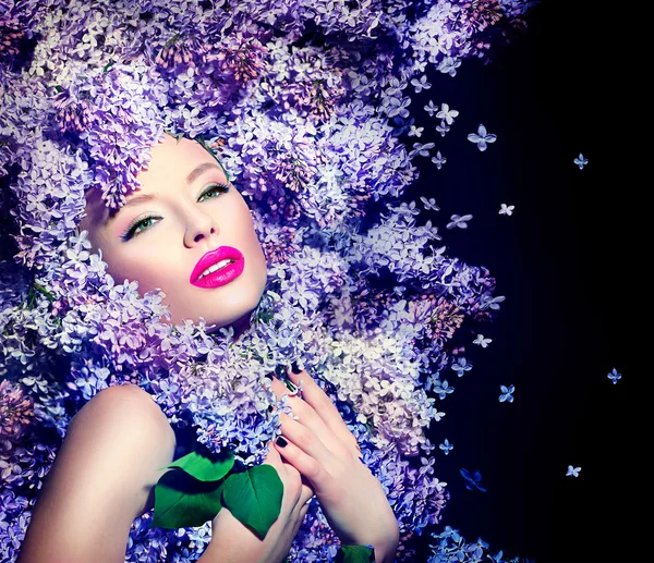 Girl with lilac flowers hairstyle — Stock Photo, Image