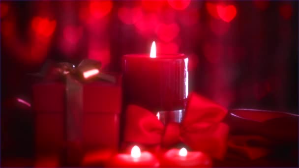 Red candles are burning over table. — Stock Video