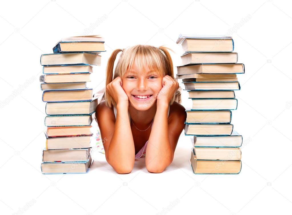 smiling schoolgirl with stack of books.