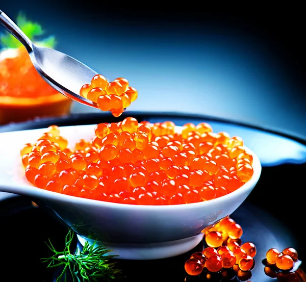 Red caviar in spoon — Stock Photo, Image