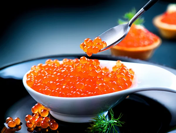 Caviar. Red caviar in spoon — Stock Photo, Image