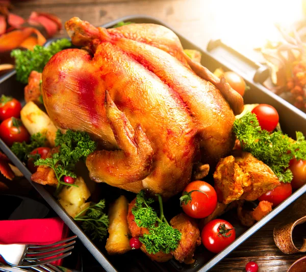 Roasted turkey garnished with potato — Stock Photo, Image