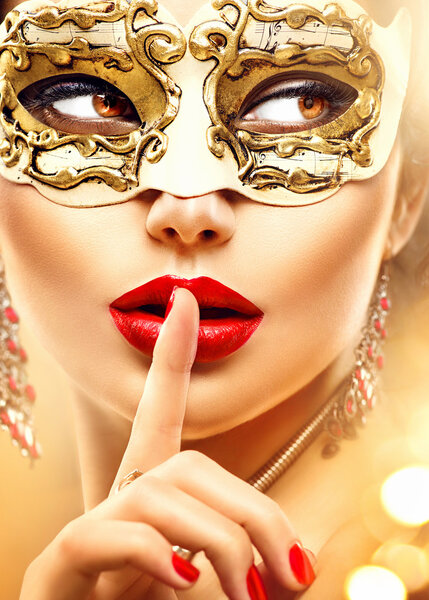 woman wearing venetian  carnival mask