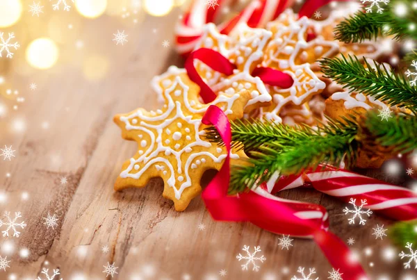 Weihnachten Hintergrund mit Plätzchen und Zuckerstangen — Stockfoto