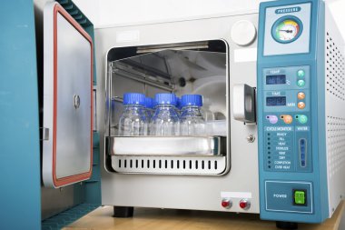 Modern laboratory autoclave sterilizer clipart