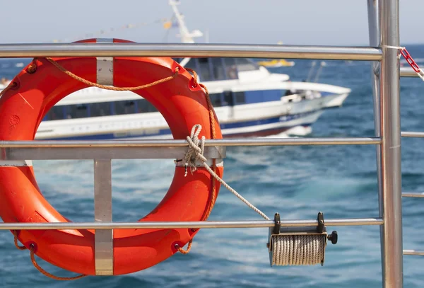 Lifebuoys on yacht side. — Stock Photo, Image