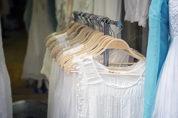 White dresses on hangers — Stock Photo, Image