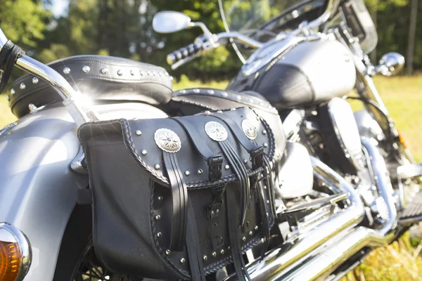 Rear part of motorcycle. Black leather bag. — Stock Photo, Image