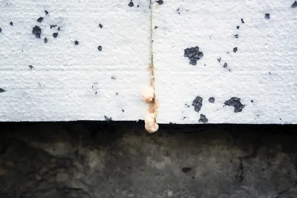 Polyurethane insulation foam between polystyrene foam. — Stock Photo, Image