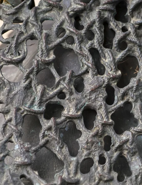 Латунная декоративная текстура решётки, как рыбная сетка крупным планом . — стоковое фото