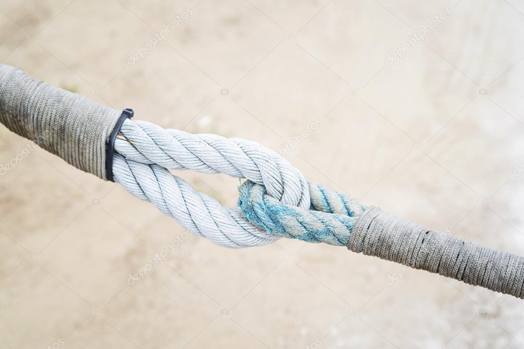 A mooring ropes tied each other a knotted end.