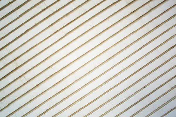 Stone white pavement with diagonal stripes as a background, top — Stock Photo, Image