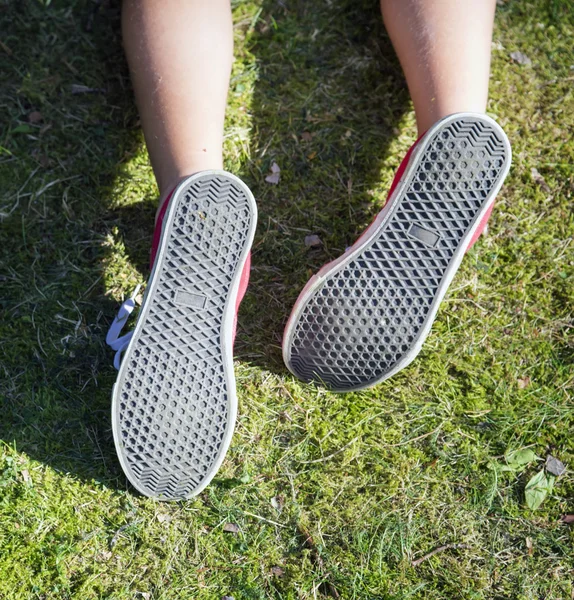 Sole of red sneakers close-up isolated — Stock Photo, Image