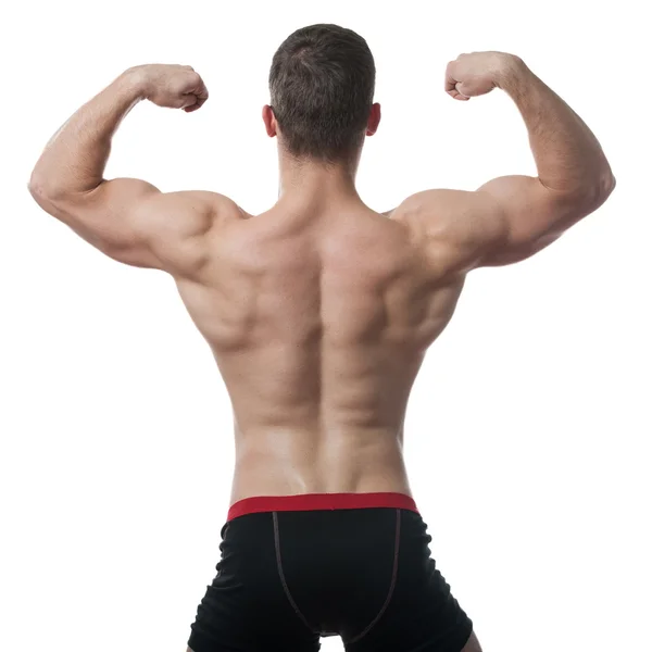 Deportista muscular posando —  Fotos de Stock