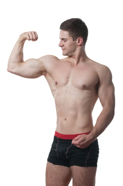 Muscular sportsman posing — Stock Photo, Image