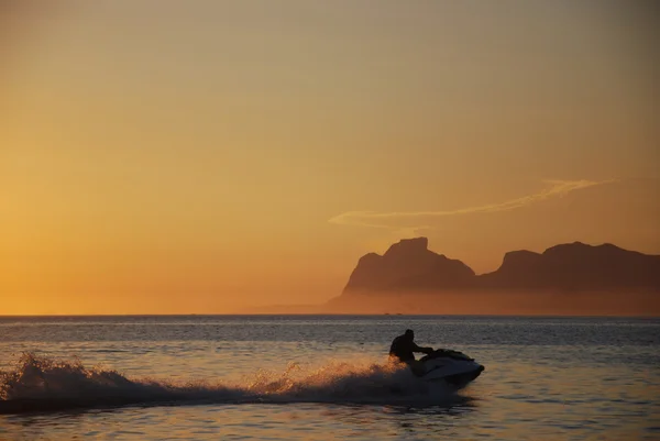 Jet-ski on sunset on Itaipu Beach — Stock Photo, Image