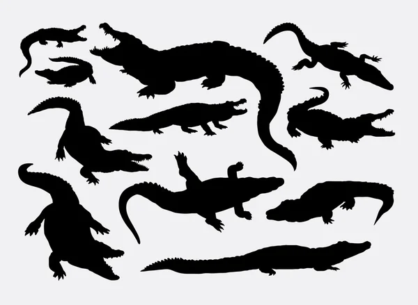 Crocodile reptile wild animal silhouettes — Stock Vector