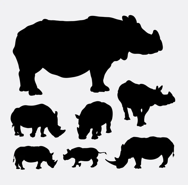 Rhinoceros silhouettes — Stock Vector