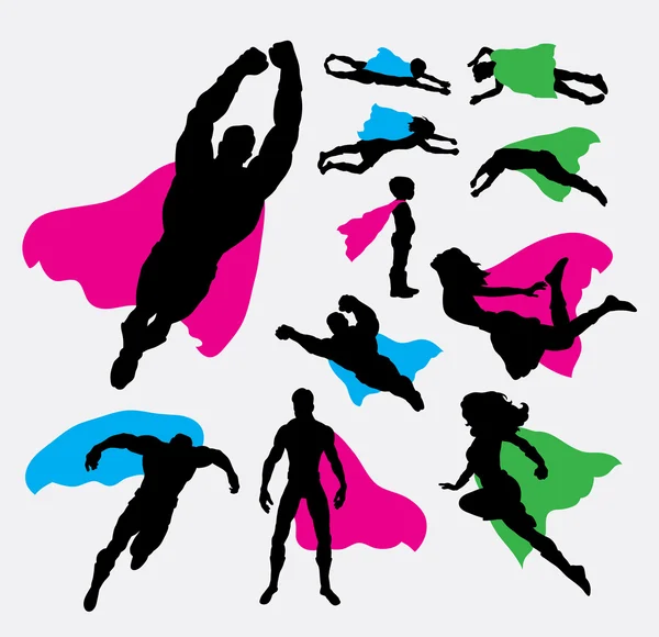 Male and female superhero silhouettes — Stock Vector