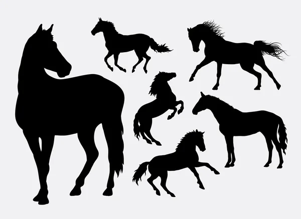 Horse silhouettes — Stock Vector