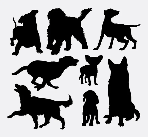 Dog action silhouettes — Stock vektor