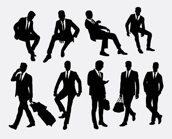 Homme d'affaires assis et debout silhouettes . — Image vectorielle