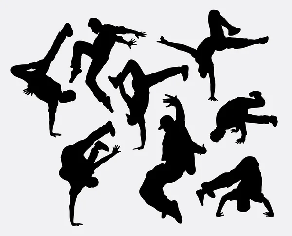 Mensen breakdance silhouetten. — Stockvector