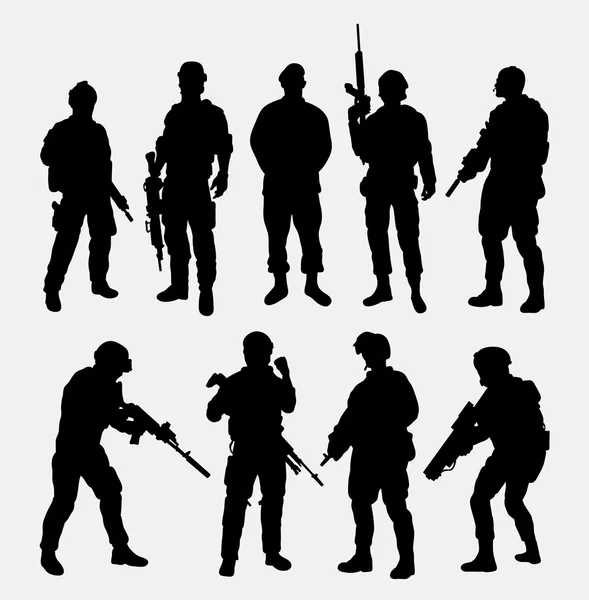 Soldier military with weapon pose silhouette. — Stock Vector