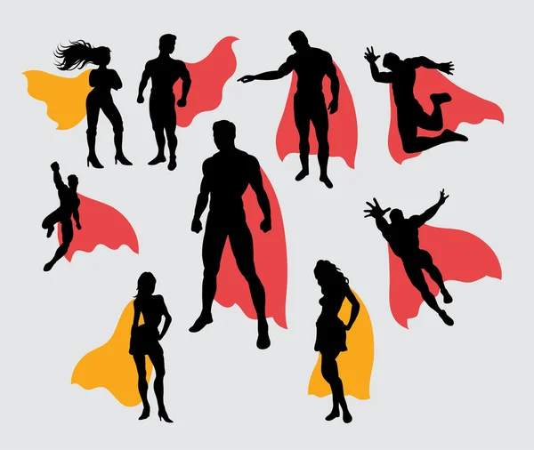 Superman en supergirl silhouetten — Stockvector