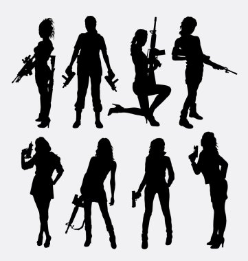 Woman sexy pose with gun silhouette