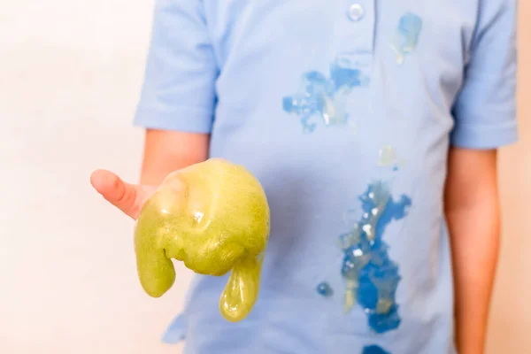 Dirty slime stains on childrens clothes.daily life dirty stain for wash and clean concept — Stock Photo, Image