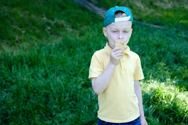 Cute Boy Eating Ice Cream Cone Stains His Mouth High — Stockfoto