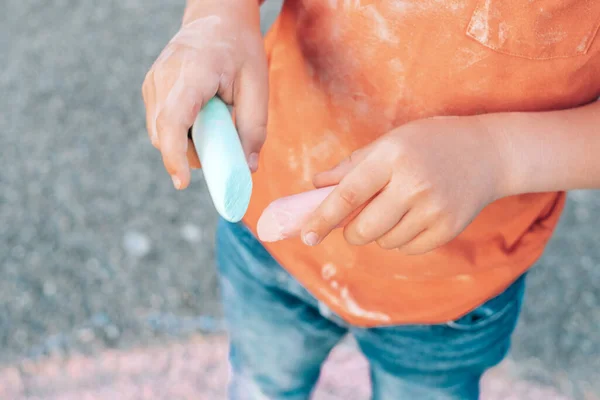 Child Taking Colored Chalk His Hands Dirty Shirt Front High — Stock Photo, Image