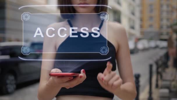 Молодой человек взаимодействует с голограммой Access — стоковое видео