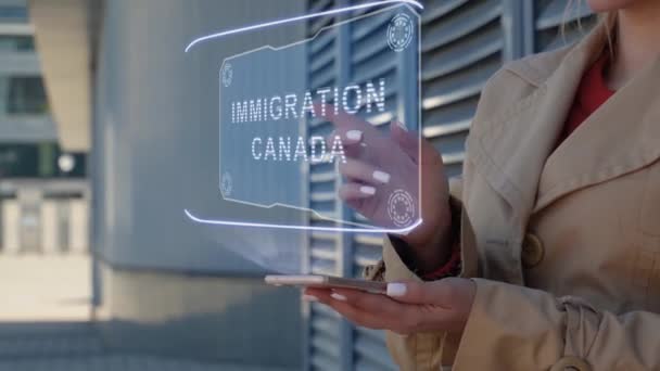 Businesswoman interacts HUD Immigration Canada — Stock Video