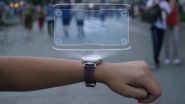 Mão feminina com holograma rotativo hotel — Vídeo de Stock