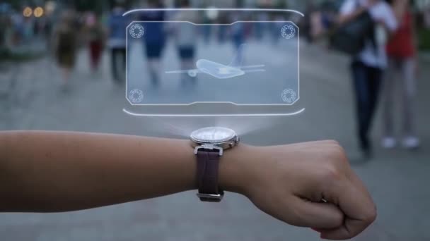 Mão feminina com holograma de avião de passageiros — Vídeo de Stock